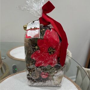 bag of decorative pinecone potpourri or vase filler, likely scented.
